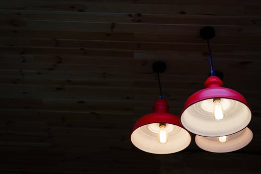Round stylish lampshade on dark background photo
