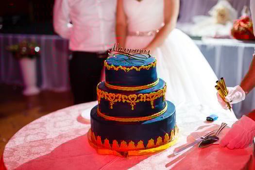 Wedding blue cake with edible gold leaf photo