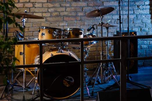 Modern drum set shot in smoky dark studio photo