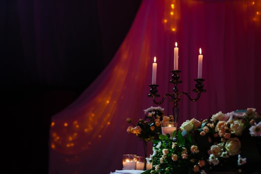 wedding candlestick with flower decoration before wedding ceremony photo