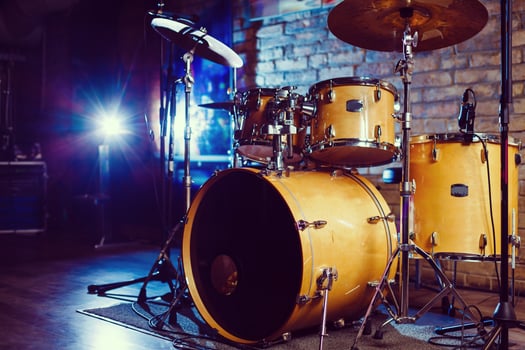 Modern drum set shot in smoky dark studio photo