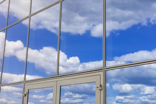 modern blue glass wall of skyscraper photo