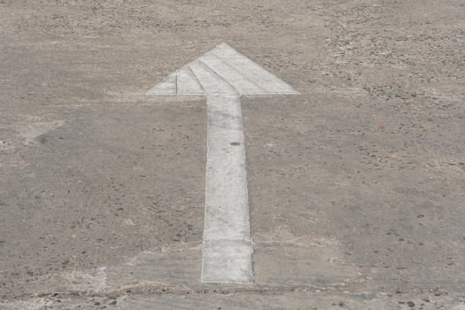 Arrow symbol on the road, go straight. photo