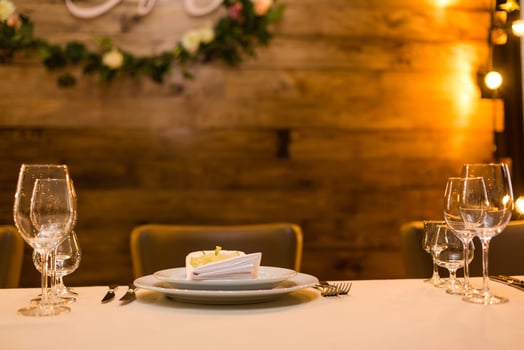 A very nicely decorated wedding table appointments with candles. Forest style dinner table. photo