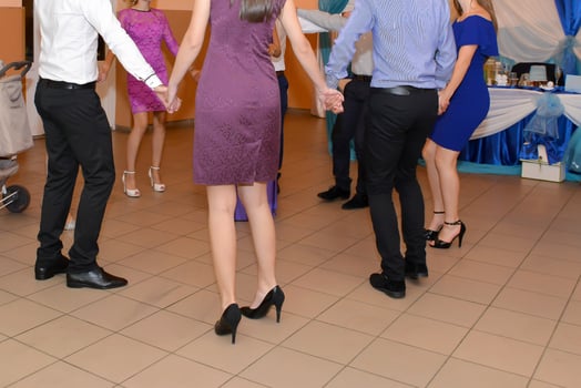 People dancing at the wedding party. focus on legs photo