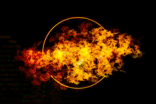 orange flame circle frame on black background photo