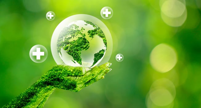 Green globe inside concept balloons protecting the environment and nature photo