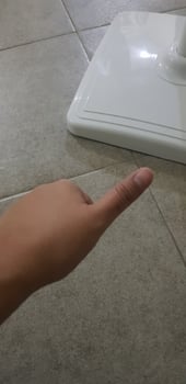 A hand giving a thumbs up. photo