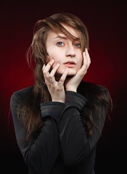 Portrait of a young emotional woman photo