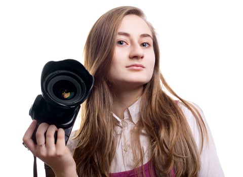 Young woman photographer photo