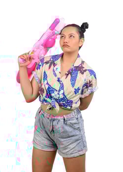Portrait smiley woman in Songkran festival with water gun photo