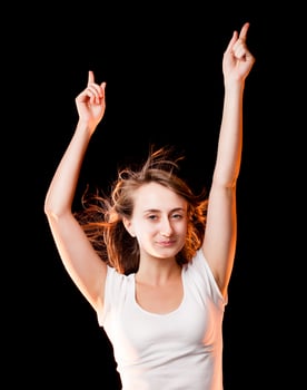 Portrait of a beautiful young woman dancing photo