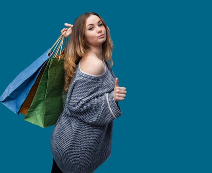 Young pretty girl with shopping bags photo