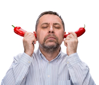 middle-aged man with a red peppers photo