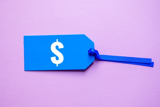 dollar symbol on the blue price tag photo