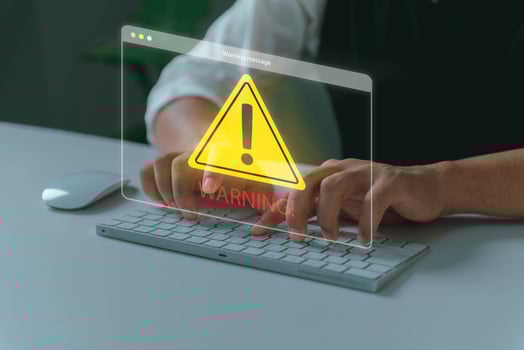 System hacked warning alert, Man using laptop with cyber attack network, virus, spyware, scam or Malicious software. Cyber security and cybercrime. Compromised information internet photo