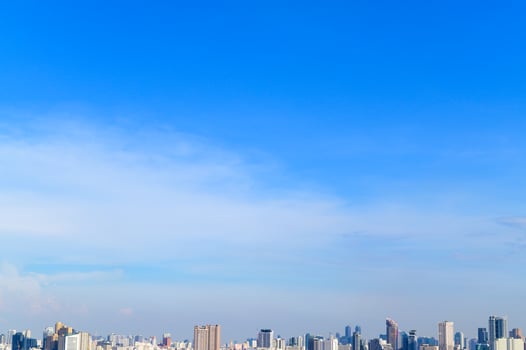 blue clear sky in summer day over the city photo