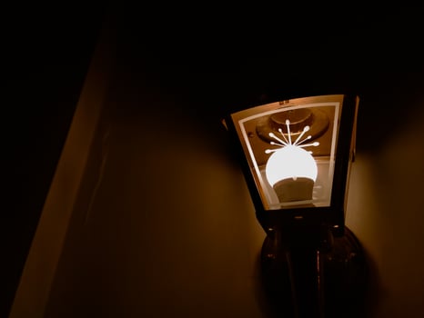 bedroom lamp in hotel room photo