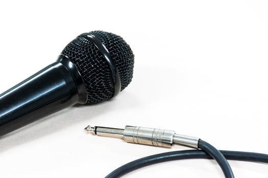 Close up microphone on white background photo