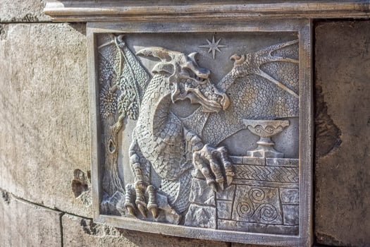 Antiquity in detail. Decoration of houses, balconies, windows, sculptures, walls. Elements of architectural design of buildings. Old plaster, Stone decorations. Elements of Gothic architecture photo