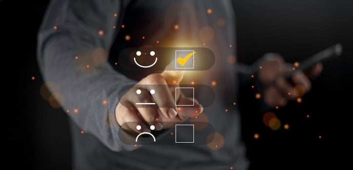 Businessman pressing smiley face emoticon on virtual touch screen. User give rating to service experience on online application for Customer review satisfaction feedback survey concept. photo