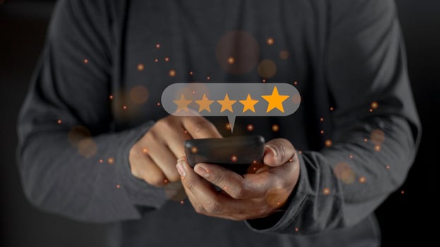 Businessman pressing smiley face emoticon on virtual touch screen. User give rating to service experience on online application for Customer review satisfaction feedback survey concept. photo
