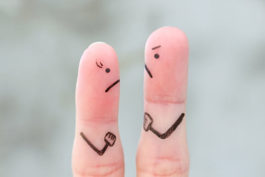 Fingers art of couple during quarrel. photo