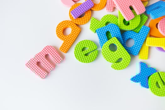Multicolored letters. Letters for the study of children in kindergarten or school, fluted letters, tactile letters. photo