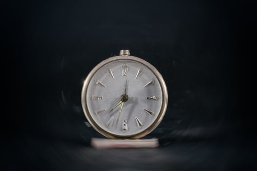Antique vintage table clock. With blur effect photo