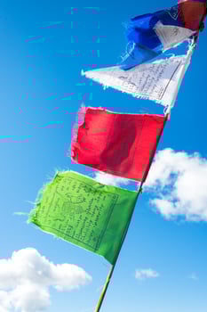Tibetan prayer flags with photo