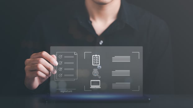 a man reviewing and managing business documents and agreements online,signing a business contract approval of contract documents confirmation or warranty certificate,employment idea, project review photo