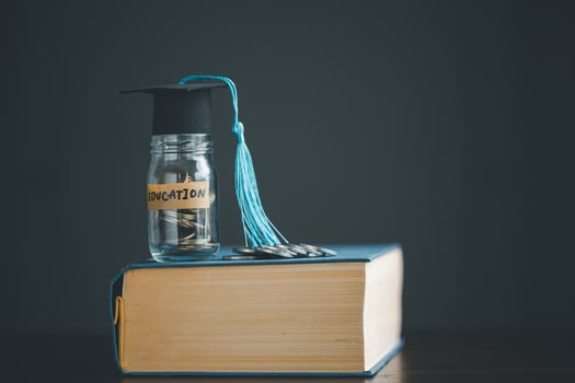 Saving money coin with banking investment, finance education concept. Planning student loan for studying abroad for college or university degree. Future children's education fund cash. Growing saving photo