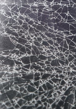 Cracked screen. Broken glasses. Cracked glass surface. Cracked glass of broken smart phone. photo