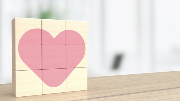 The wood cube and pink heart for valentine or love concept 3d photo