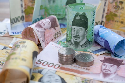 Korean currency . Bank notes and coins used as a medium of exchange. Stimulate production and help drive products from production sources to consumers. photo
