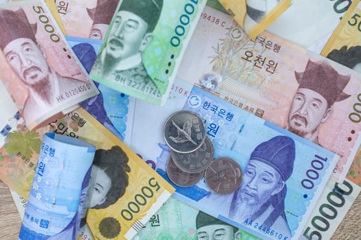Korean currency . Bank notes and coins used as a medium of exchange. Stimulate production and help drive products from production sources to consumers. photo