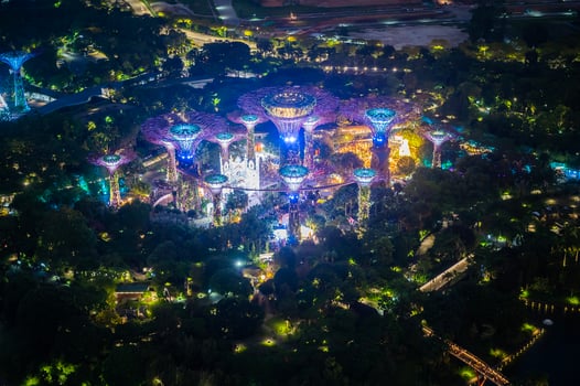 Singapore City, Singapore - dec 27, 2022 Aerial top view of  super tree grove architecture at night in garden landmark by the Bay and Marina Bay Sands hotel . Singapore. photo
