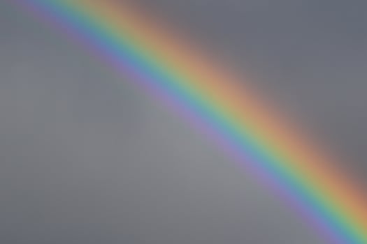 Rainbow over stormy sky. photo