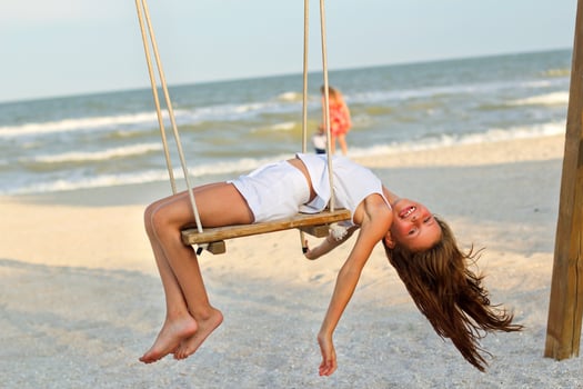 Funny cheerful little girl photo
