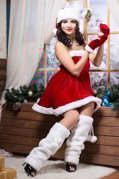 Woman wearing like Santa's helper photo