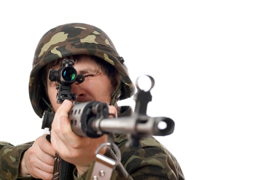 Soldier aiming a rifle photo