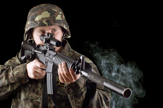 Soldier with the smoking gun photo
