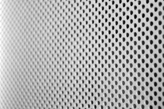 Metal Texture with Many Tiny Round Wholes photo