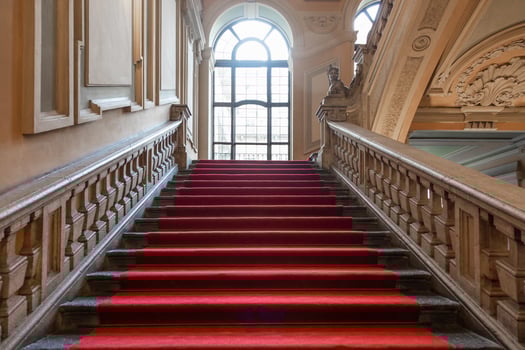 Turin, Italy - Palazzo Barolo staircase. Luxury palace with old baroque interior and red carpet photo