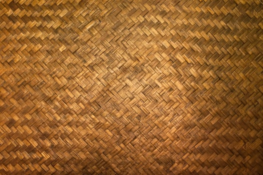 Dark Texture of bamboo handicraft detail , Pattern of Thai style bamboo handcraft texture background , vintage wall photo