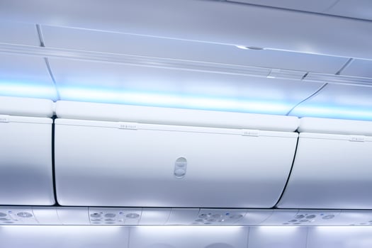 Airplane cabine with luggage compartments,luggage ready for departure on board aircraft photo
