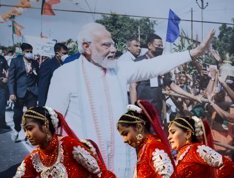 New Delhi, India - January 16 2023 - Thousands of people collected during Prime Minister Narendra Modi BJP road show, people during PM Modi big election rally in the capital photo