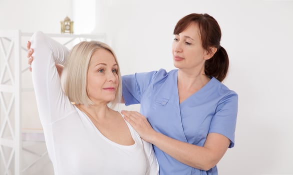 Physiotherapy, sport injury rehabilitation treatment. Woman having chiropractic back adjustment. Osteopathy, Alternative medicine, pain relief concept. photo