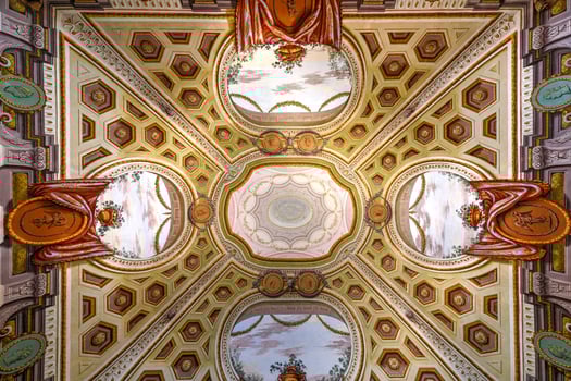 Caserta, Italy - Aug 21, 2021, A internal view of the Royal Palace of Caserta, a historic palace commissioned in the 18th century by Charles of Bourbon, king of Naples. photo