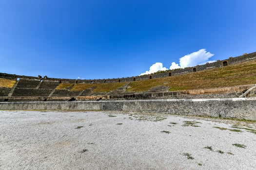 Amphitheatre in ancient Roman city of Pompeii. The Amphitheatre of Pompeii is one of the oldest surviving Roman amphitheatres. photo